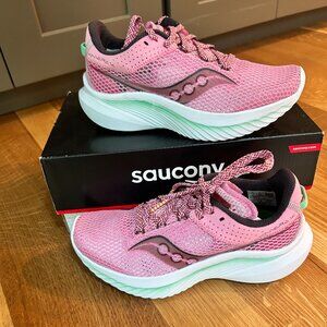 Pink and mint colored saucony running shoes for girls size 6